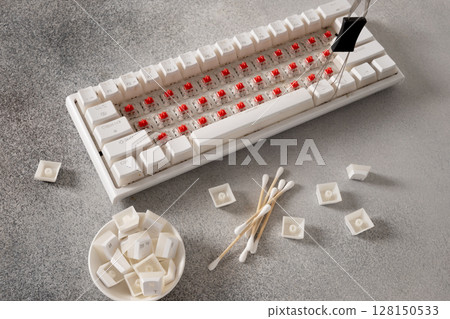 Dirty mechanical keyboard with white keycaps. Service. Concept cleaning buttons. Dirty mechanical keyboard with white keycaps. Service. Concept cleaning buttons. 128150533