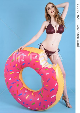Beautiful redhead model dressed in various outfits for Summer 128151663