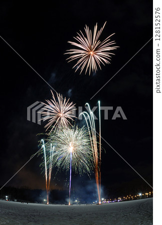 Fireworks launched from the snow in a park in Hokkaido with the moon, Venus, and Saturn in the background Fireworks launched from the snow in a park in Hokkaido with the moon, Venus, and Saturn in the background 128152576