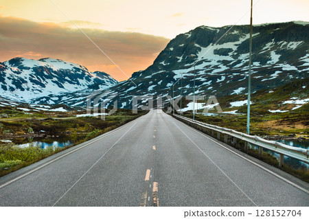 road in Hardangervidda plateau in Norway. road in Hardangervidda plateau in Norway. 128152704