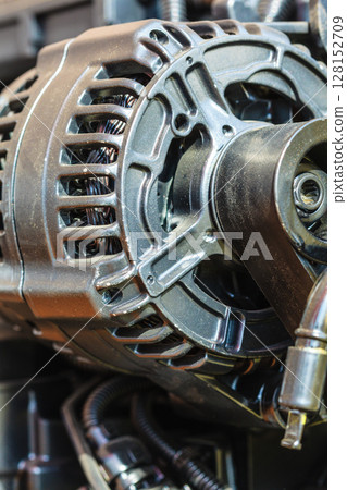 Detailed closeup of alternator generator machine engine 128152709