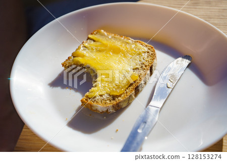 Breakfast. Rye bread slice with honey Breakfast. Rye bread slice with honey 128153274