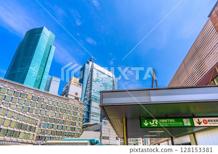Tokyo cityscape, Japan, July 4th. View of Yurikamome's Shinbashi Station, JR Shinbashi Station, and the Shiodome business district. Tokyo cityscape, Japan, July 4th. View of Yurikamome's Shinbashi Station, JR Shinbashi Station, and the Shiodome business district. 128153381