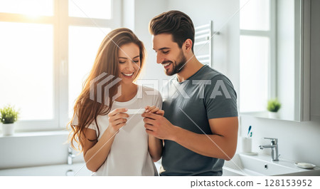 A couple looking at a pregnancy test together, sharing a joyful and emotional moment. The concept of partnership, new life, and the beginning of parenthood. Generative AI. 128153952