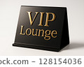 Close-up luxury VIP Lounge sign with gold serif engraving on matte black metal 128154036