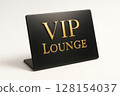 Close-up luxury VIP Lounge sign with gold serif engraving on matte black metal 128154037