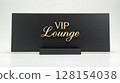 Close-up luxury VIP Lounge sign with gold serif engraving on matte black metal 128154038