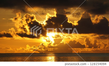 Morning sun over the horizon Morning sun over the horizon 128154094