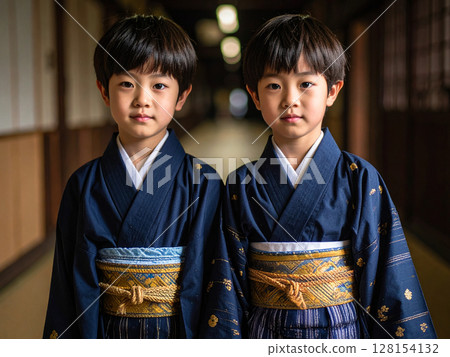 Twin boys in kimonos 128154132