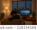 young man watching tv at home in living room 128154168