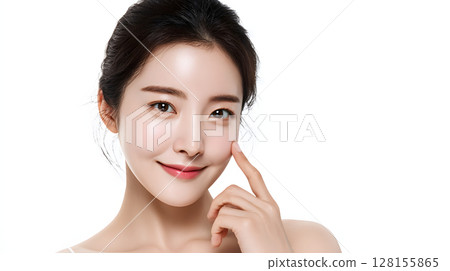 Smiling woman undergoing skin care, beauty portrait highlighting radiant skin 128155865