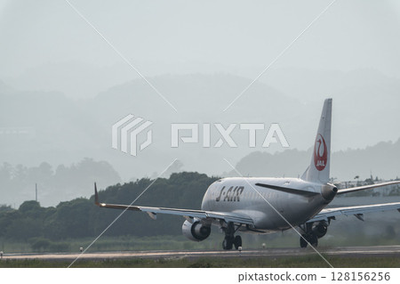 Sendai Airport at dusk, airplane taking off, Natori City, Miyagi Prefecture 128156256