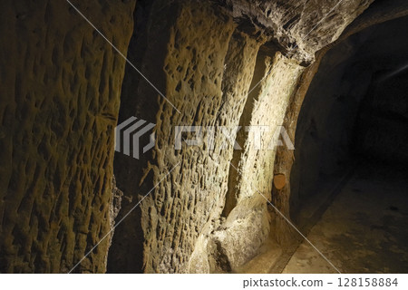 Passageway of the former naval headquarters cave in Okinawa Passageway of the former naval headquarters cave in Okinawa 128158884