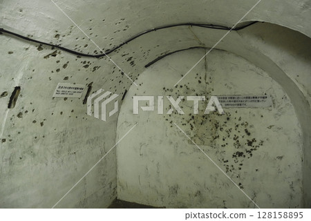 Staff room in the former naval headquarters cave in Okinawa Staff room in the former naval headquarters cave in Okinawa 128158895