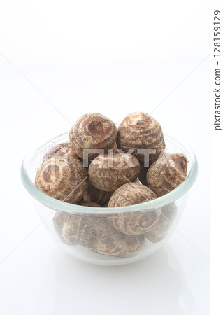 Washed taro in a glass bowl Washed taro in a glass bowl 128159129