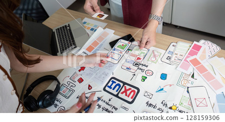 Creative UX and UI design process in action. Creative UX and UI design process in action. 128159306
