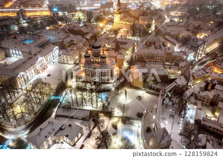 Aerial night View of Tallinn in winter with Alexander Nevsky Cathedral, roofs with snow, Christmas mood Aerial night View of Tallinn in winter with Alexander Nevsky Cathedral, roofs with snow, Christmas mood 128159824