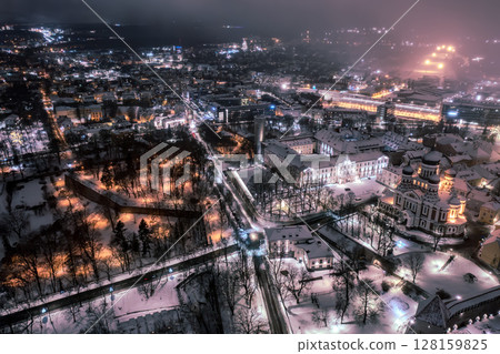 Aerial night View of Tallinn in winter with Alexander Nevsky Cathedral, roofs with snow, Christmas mood Aerial night View of Tallinn in winter with Alexander Nevsky Cathedral, roofs with snow, Christmas mood 128159825