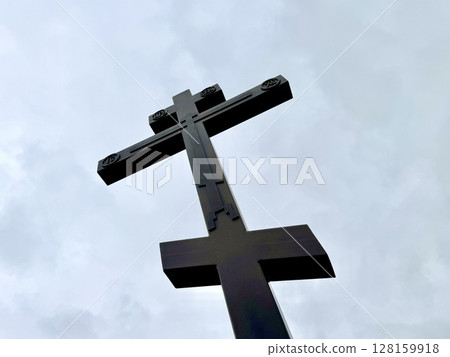 cross against blue sky. High quality photo 128159918