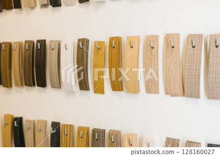 Variety of wood veneer samples on display in various shades and textures 128160027
