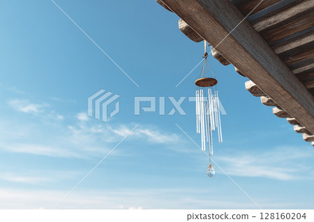 Glass wind chimes swaying in the blue sky and the summer scenery under the eaves 128160204
