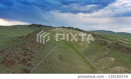Aerial view of mountains at sunset in Mongolia 128160534