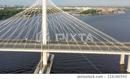 Aerial view of cable-stayed bridge with cars Aerial view of cable-stayed bridge with cars 128160543