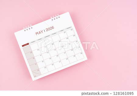 May desk calendar for 2026 year on pink background for schedule to make appointment meeting. 128161095
