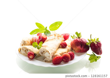 Pancakes with cottage cheese and strawberries on a white background 128161157