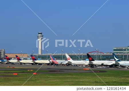International passenger planes parked at Haneda Airport Terminal 3 128161434