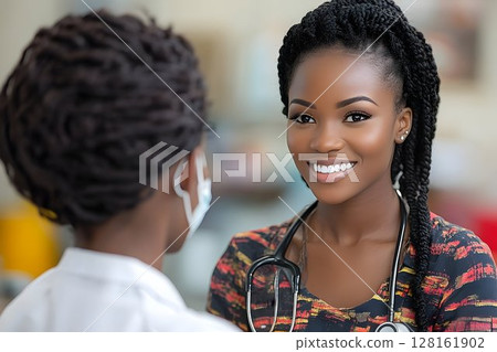Smiling African American Doctor with Braids Consults with Masked 128161902