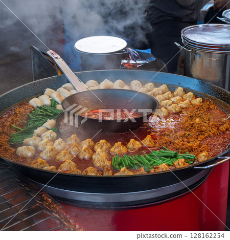 Sizzling Street Food Pan Display 128162254