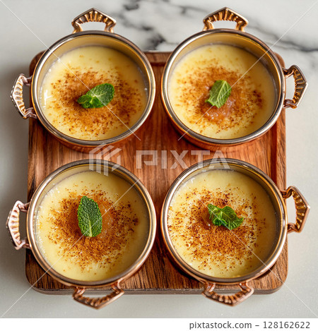Exquisite Custard Dessert in Copper Pots 128162622