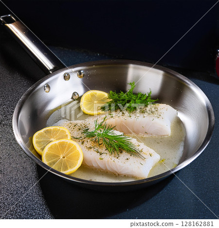 Delicate White Fish Fillets in Pan 128162881