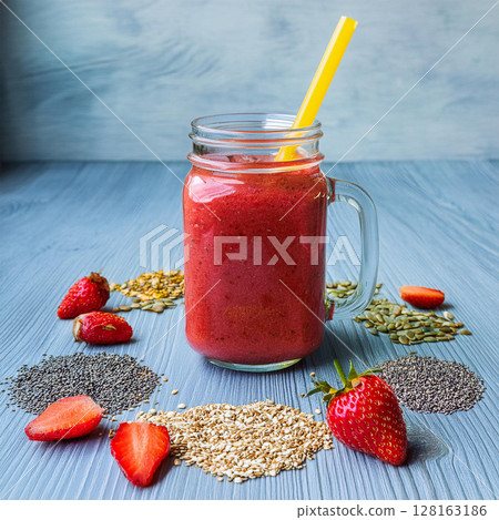Vibrant Red Smoothie in Glass Jar 128163186