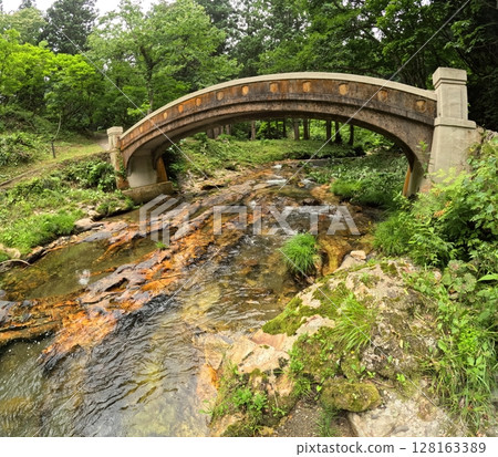 Ginzan Onsen mountain stream 128163389