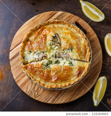 Rustic Savory Pie with Fresh Ingredients 128164003