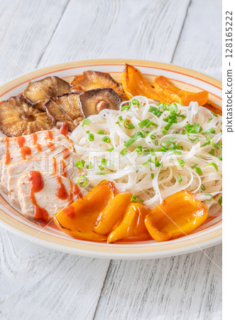 Rice Noodles with Shiitake, Grilled Peppers, Chicken, Sriracha, and Green Onion 128165222
