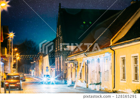 Parnu, Estonia. Night View Of Puhavaimu Street With Old Buildings, Restaurants, Cafe, Hotels And Shops In Evening Night Illuminations 128165291