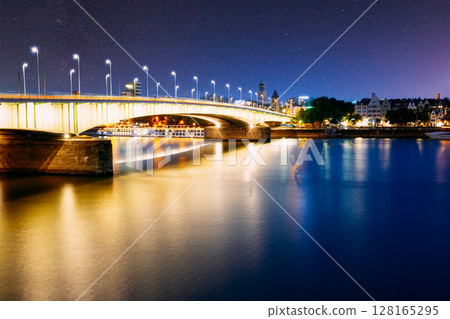 Night View Of Deutz Suspension Bridge Over River Rhine, Germany. Europe. 128165295