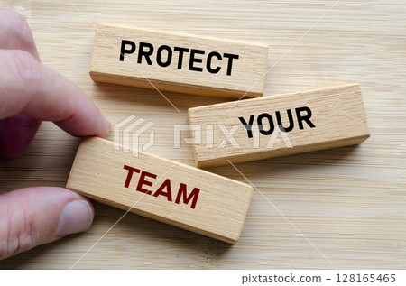 Protect your team message displayed clearly, representing the leadership duty to shield, defend, and support those under their guidance 128165465