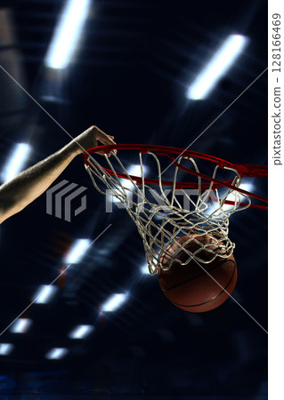 Basketball dunk under 3D stadium lights with intense motion 128166469