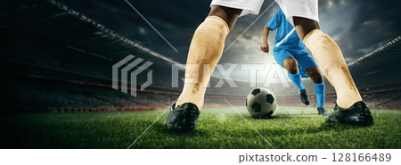 Soccer players face-off on 3D stadium field in competitive match 128166489