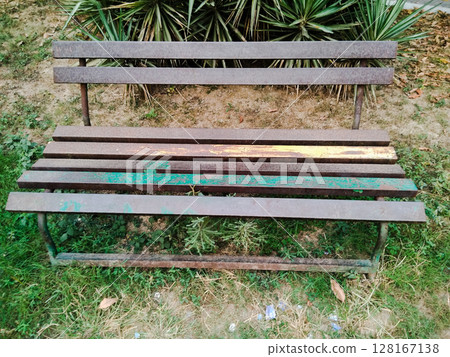 Sitting chair in garden 128167138
