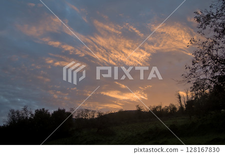 sunset of a beautiful winter day in the mountains 128167830