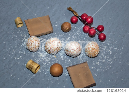 delicious cocoa balls dipped in natural coconut handmade at home delicious dessert 128168014