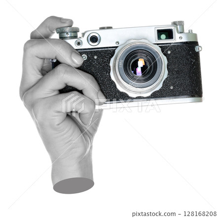 Women hand holds a retro photo camera, isolated on transparent background, front view, retro things concept. Contemporary art 128168208