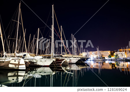 yachts at night yachts at night 128169024