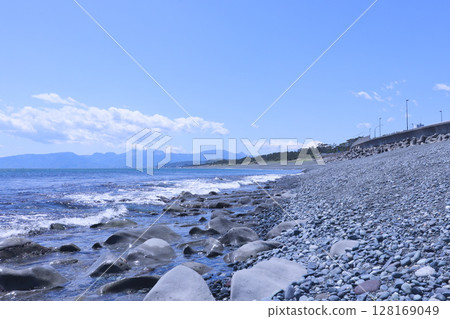 Pebble beach at low tide and Mt. Fuji 128169049