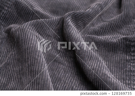 Black ribbed corduroy texture background 128169735